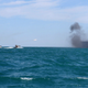 Image for article titled Iran Blows Up Gigantic U.S. Carrier Mock-Up During Naval Exercise